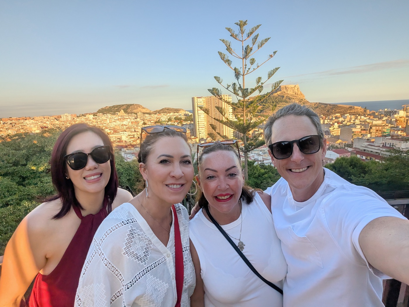 The 2026 group at a viewpoint over Alicante, with Santa Bárbara Castle behind them